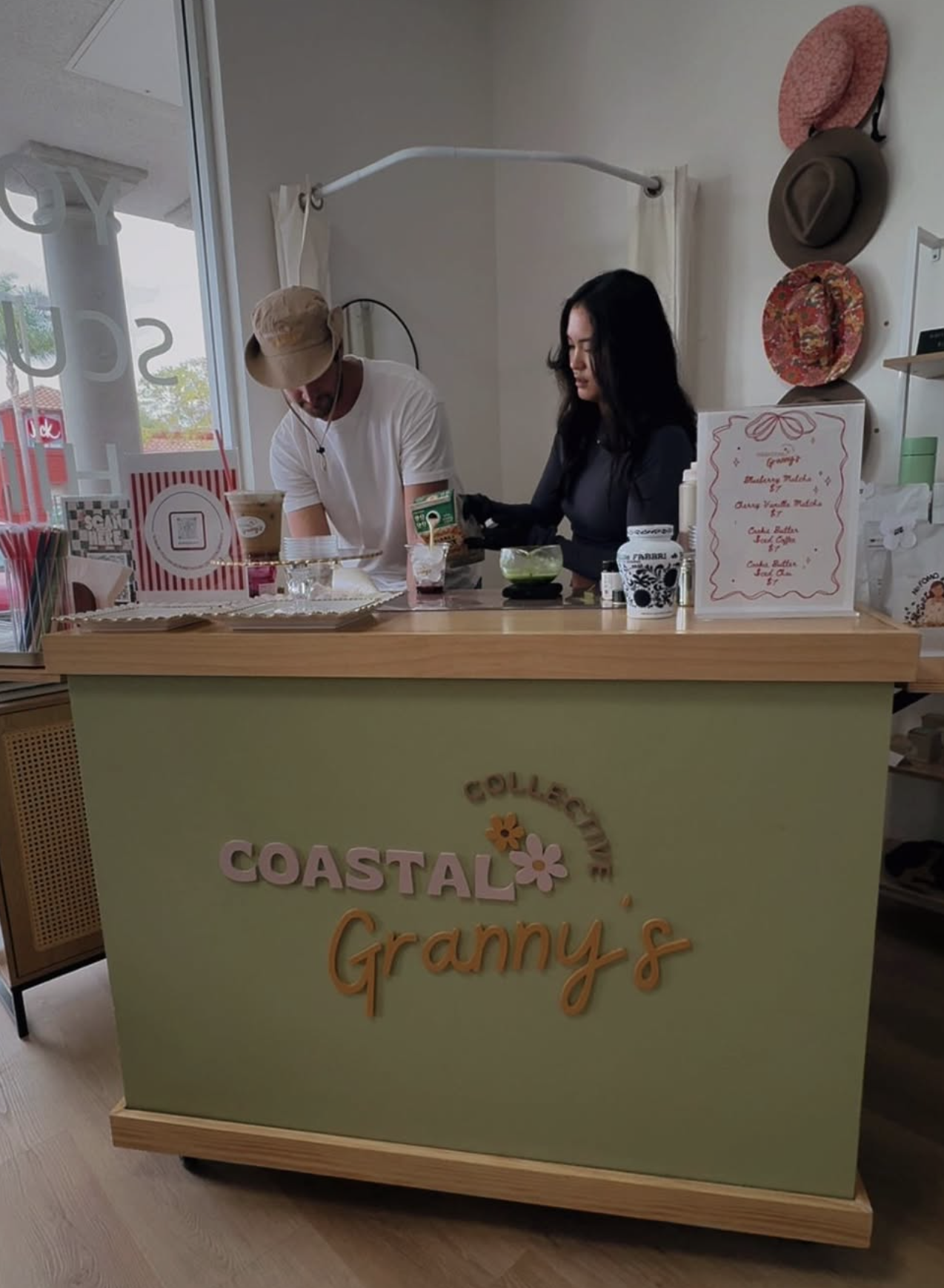 Ryan and Kelly behind the Coastal Granny's cart